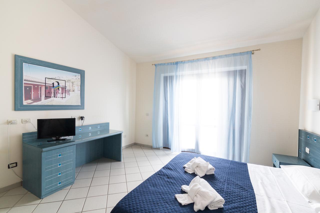 Nelema Village Resort Сан Никола Арчела Стая снимка